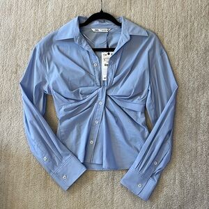Asymmetric button down top